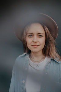 Young stylish woman in a hat. high quality photo