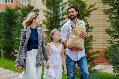 Family walking on footpath together