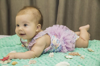 Portrait of cute baby girl at home