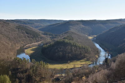 High angle view of river amidst landscape against sky