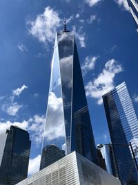 Low angle view of one world trade centre against sky