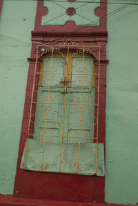 Low angle view of text on wall of building