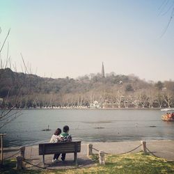 Scenic view of calm lake against clear sky