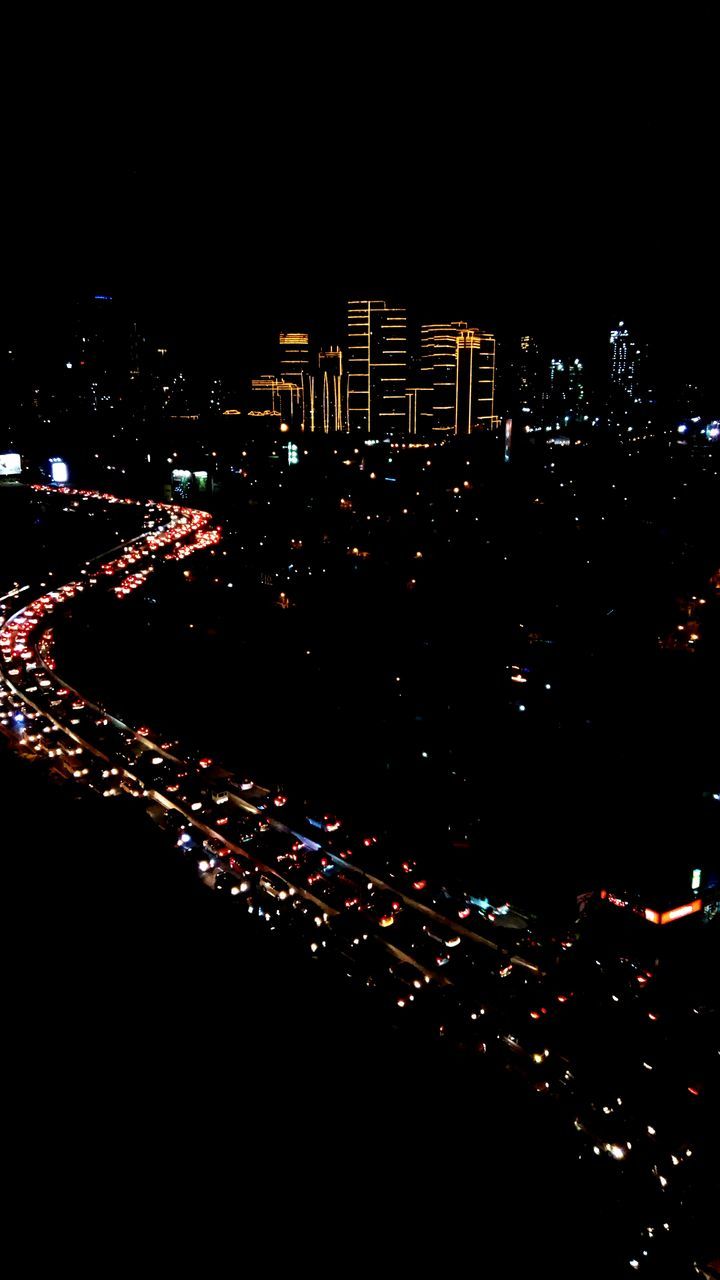 ILLUMINATED CITY AT NIGHT