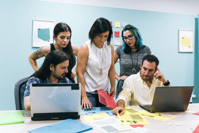 Group of people working on table