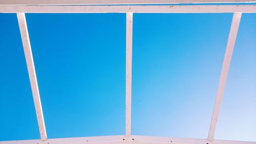 Low angle view of built structure against clear blue sky