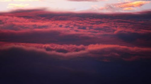 Low angle view of dramatic sky during sunset