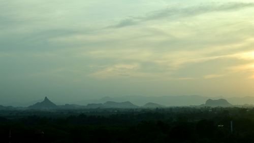 Scenic view of landscape against sky during sunset