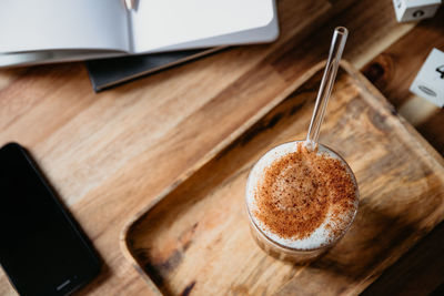 High angle view of coffee cup on table