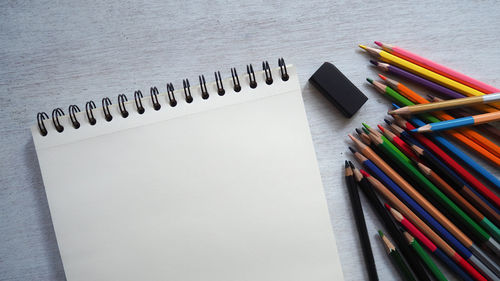 High angle view of multi colored pencils on table