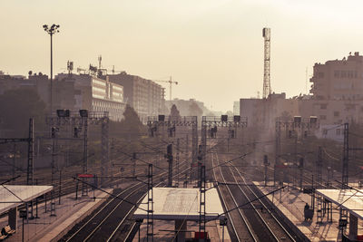 Power lines on railroad tracks in city