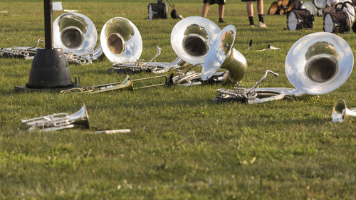 Sousaphones and other brass instruments resting during a water break