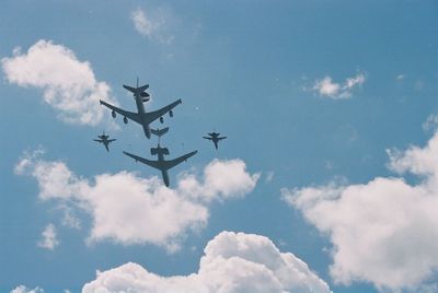 Low angle view of airplane against sky