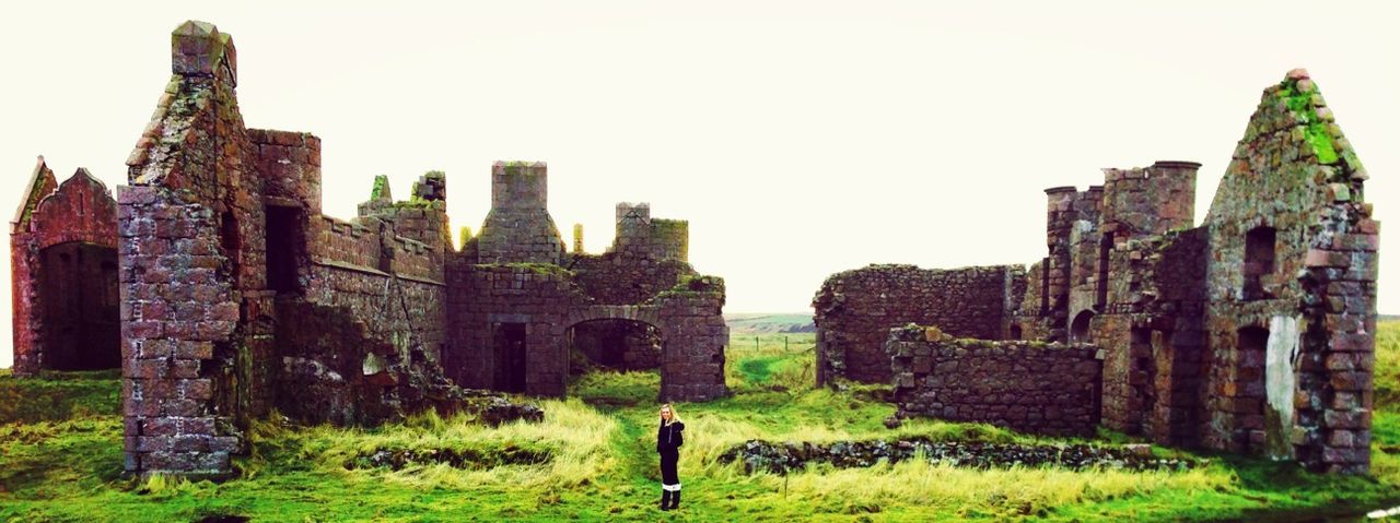 architecture, built structure, history, building exterior, old ruin, ancient, grass, old, the past, clear sky, ancient civilization, stone wall, ruined, damaged, travel destinations, famous place, archaeology, sky, abandoned, travel