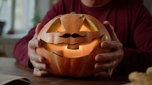 Close-up of jack o lantern on table