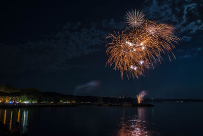 Firework display at night