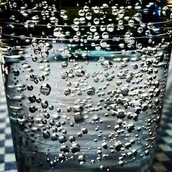 Close-up of water drops on glass