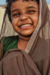 Close-up portrait of a smiling boy