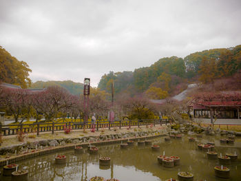 Panoramic view of bridge over river against sky