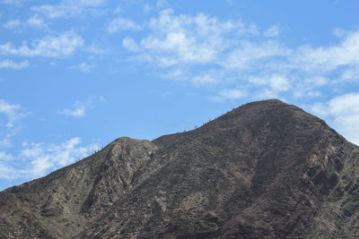 Low angle view of mountain against sky