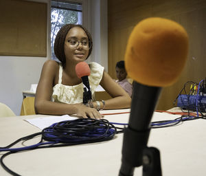 Portrait of young woman drinking juice
