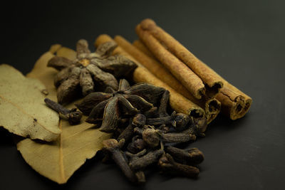 Close-up of crab on table against black background