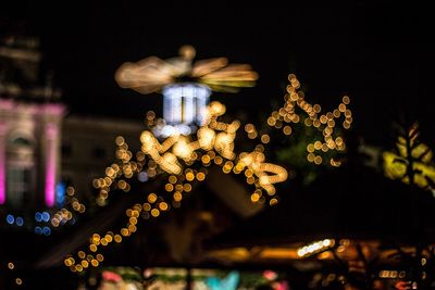 Low angle view of illuminated christmas tree