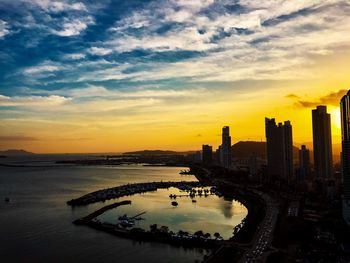 Aerial view of city at sunset