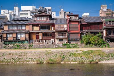 View of residential buildings against clear sky
