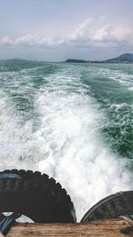 Scenic view of sea against cloudy sky