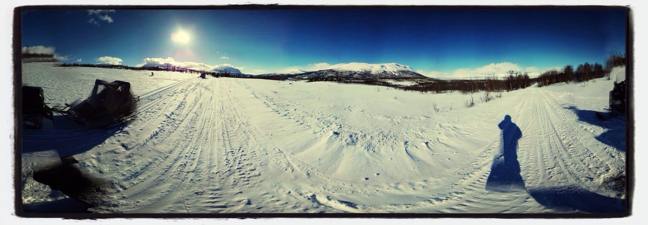 snow, transfer print, cold temperature, winter, auto post production filter, sky, tranquil scene, tranquility, season, mountain, landscape, scenics, beauty in nature, nature, sunlight, weather, panoramic, blue, sun, snowcapped mountain