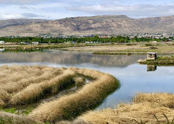 Scenic view of lake against sky