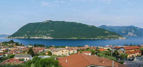 Extra wide view of monte isola in the lake iseo