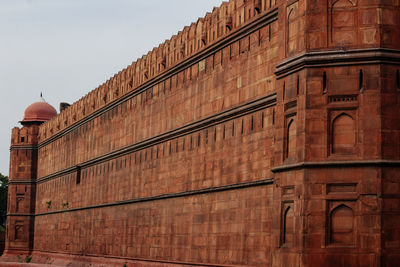 Low angle view of old building against sky