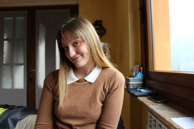 Portrait of smiling girl at home