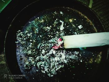 High angle view of cigarette on table