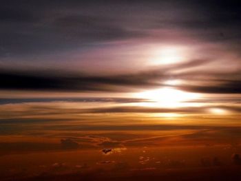 Scenic view of dramatic sky during sunset