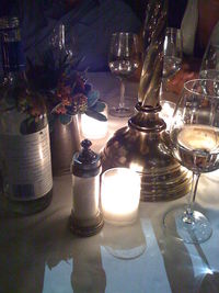 Close-up of wine glasses on table