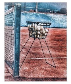 Empty chairs by swimming pool