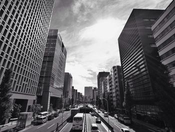 City street against cloudy sky