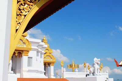 Low angle view of statue against sky