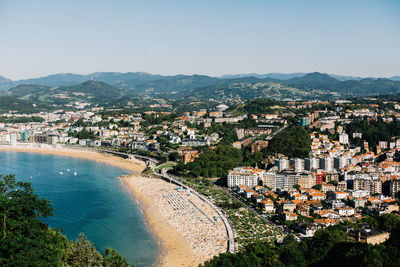 Crescent shaped playa de la concha beach in san sebastián, spain