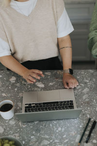 Woman using laptop