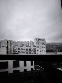 Modern cityscape against sky