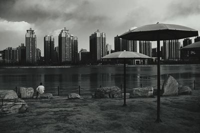 View of city against cloudy sky