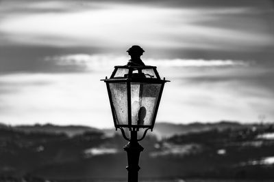 Close up of black and white street lamp in the sovizzo hills in vicenza, italy