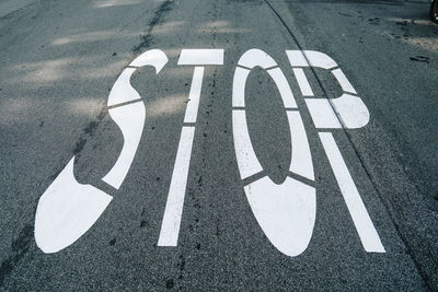 High angle view of stop sign on road