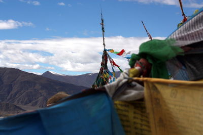 Low angle view of prayer flags against sky