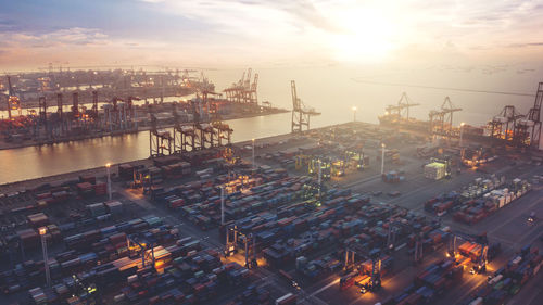 Aerial view of commercial dock during sunset