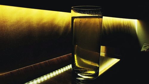 Close-up of beer glass on table